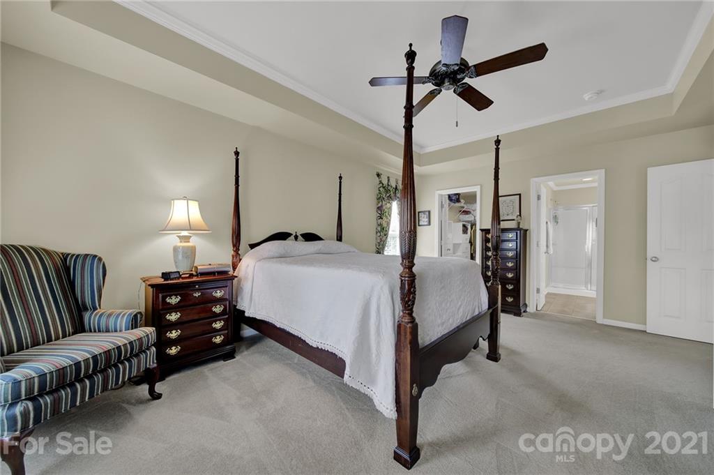 4509 Shadow Moss Circle Fort Mill, SC 29708 - Photo 14 of 43 a bed room with bed and window