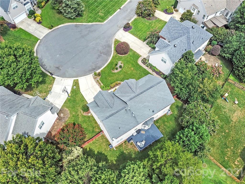 4509 Shadow Moss Circle Fort Mill, SC 29708 - Photo 41 of 43 an aerial view of a house with a backyard