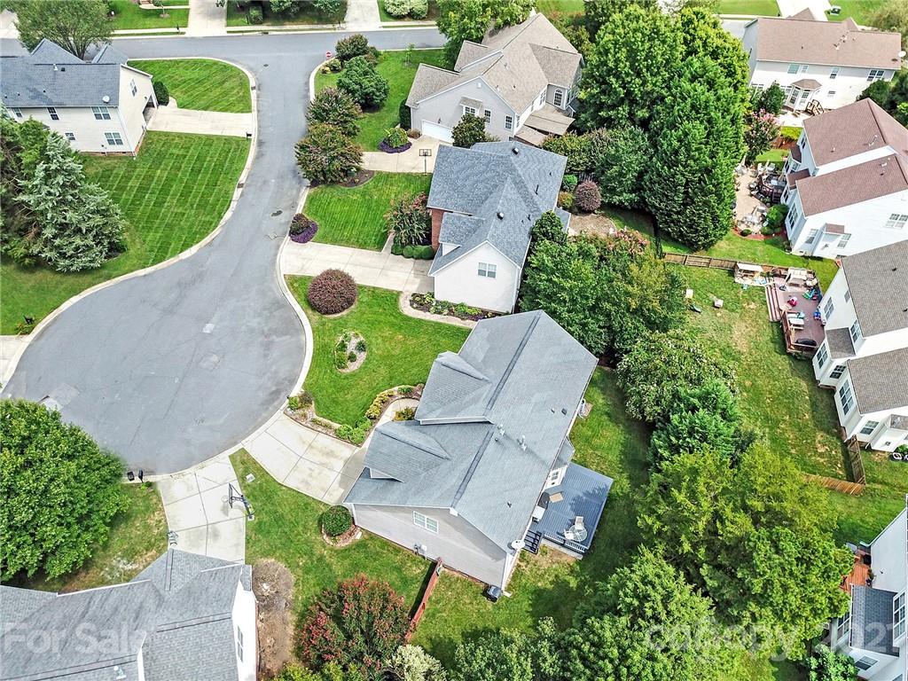 4509 Shadow Moss Circle Fort Mill, SC 29708 - Photo 42 of 43 an aerial view of a house with garden space and street view