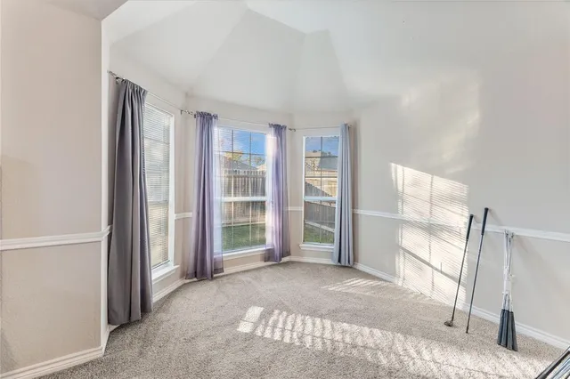 a view of empty room with front door