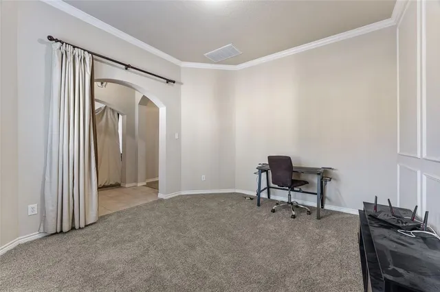 a view of a livingroom with furniture and a window