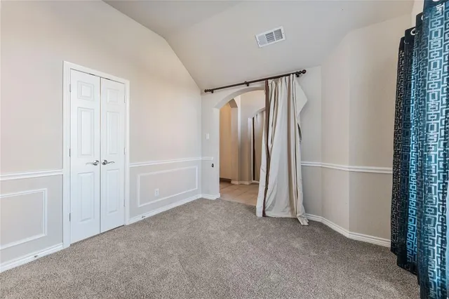 an empty room with a door