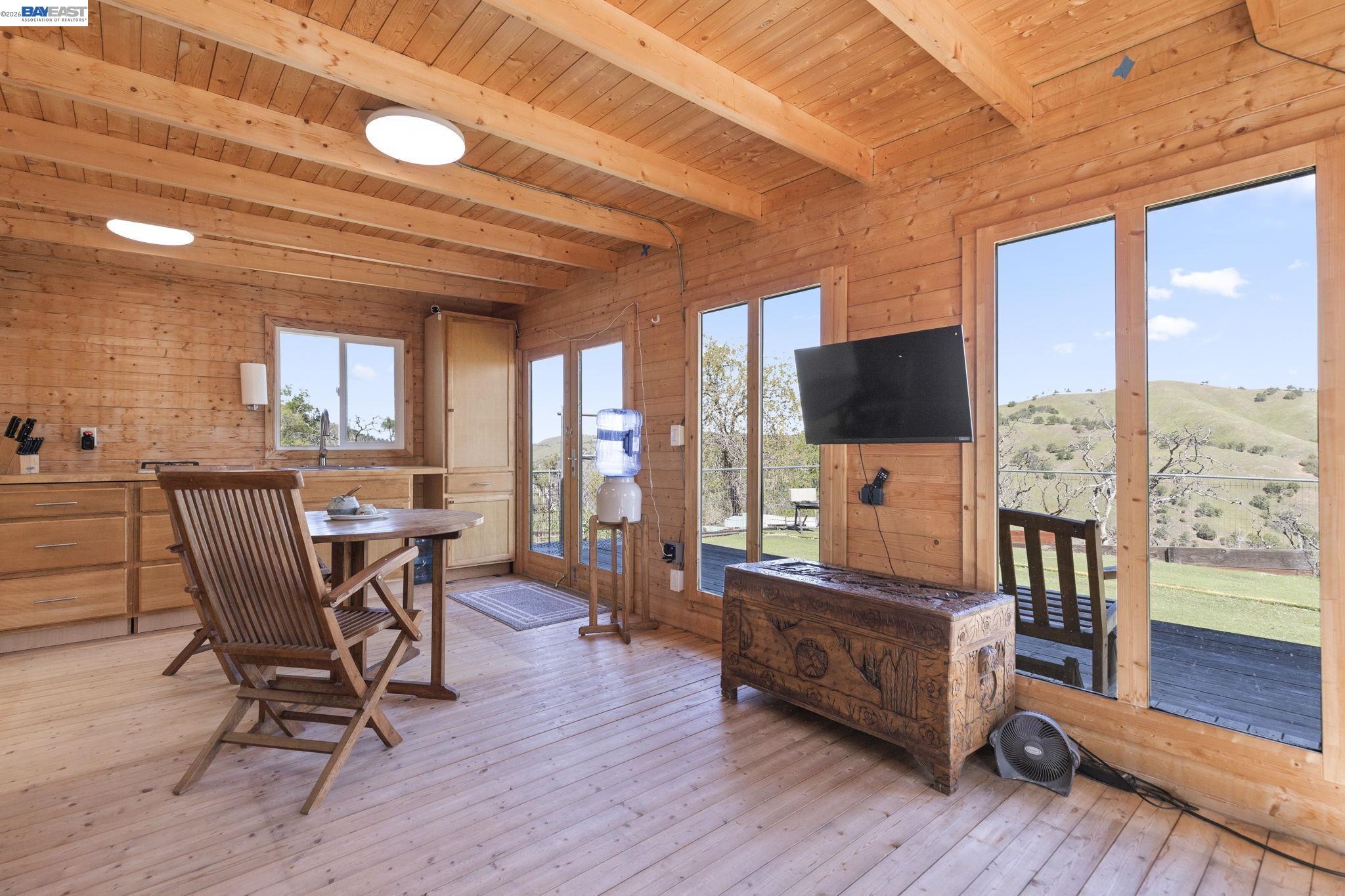 18188 West Corral Hollow Road Tracy, CA 95377 - Photo 13 of 58 a view of a livingroom with furniture and a flat screen tv