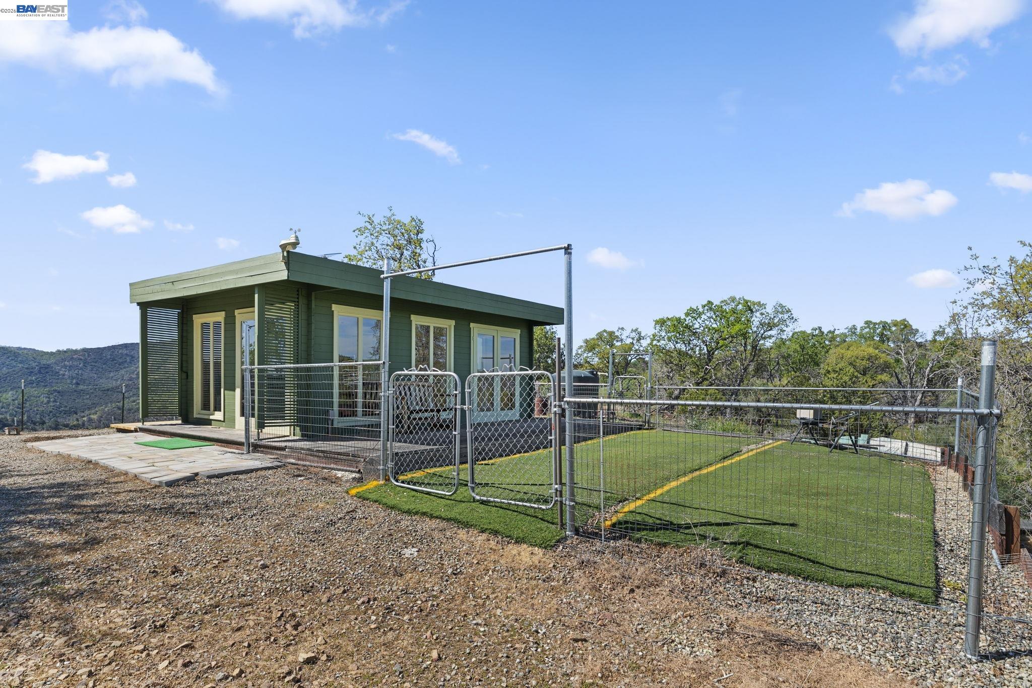 18188 West Corral Hollow Road Tracy, CA 95377 - Photo 18 of 58 a view of a house with a backyard
