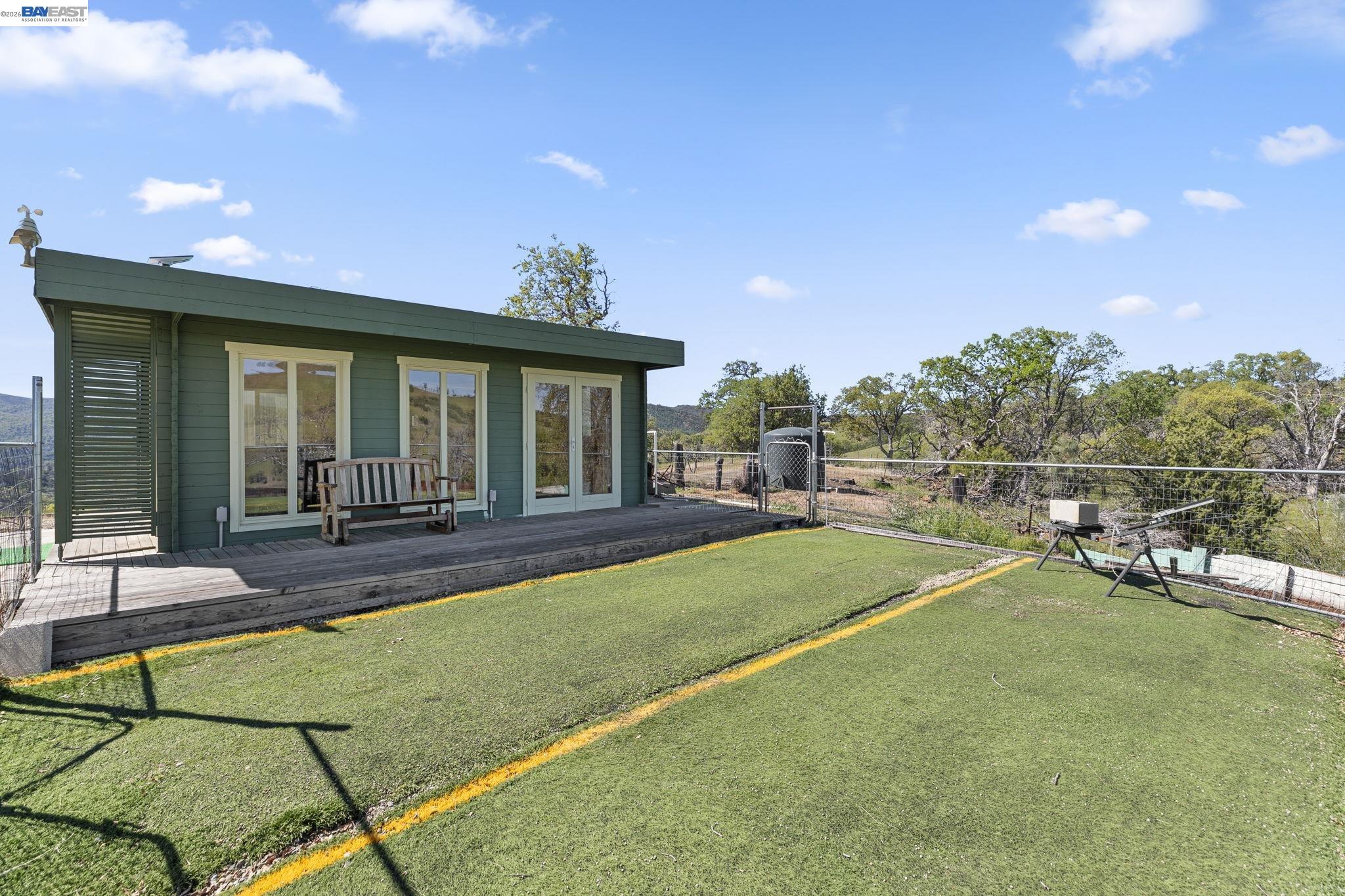 18188 West Corral Hollow Road Tracy, CA 95377 - Photo 21 of 58 a view of a house with backyard porch and patio