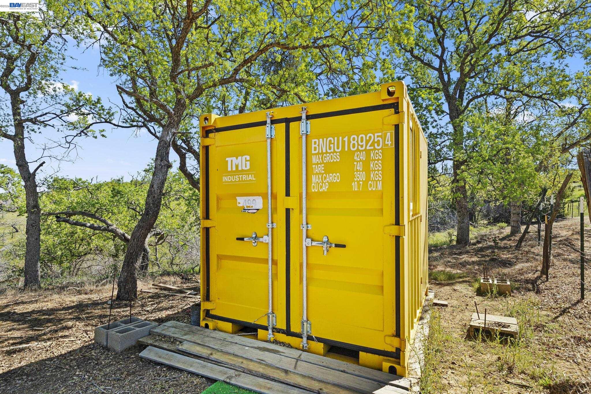 18188 West Corral Hollow Road Tracy, CA 95377 - Photo 23 of 58 a sign on the side of a building