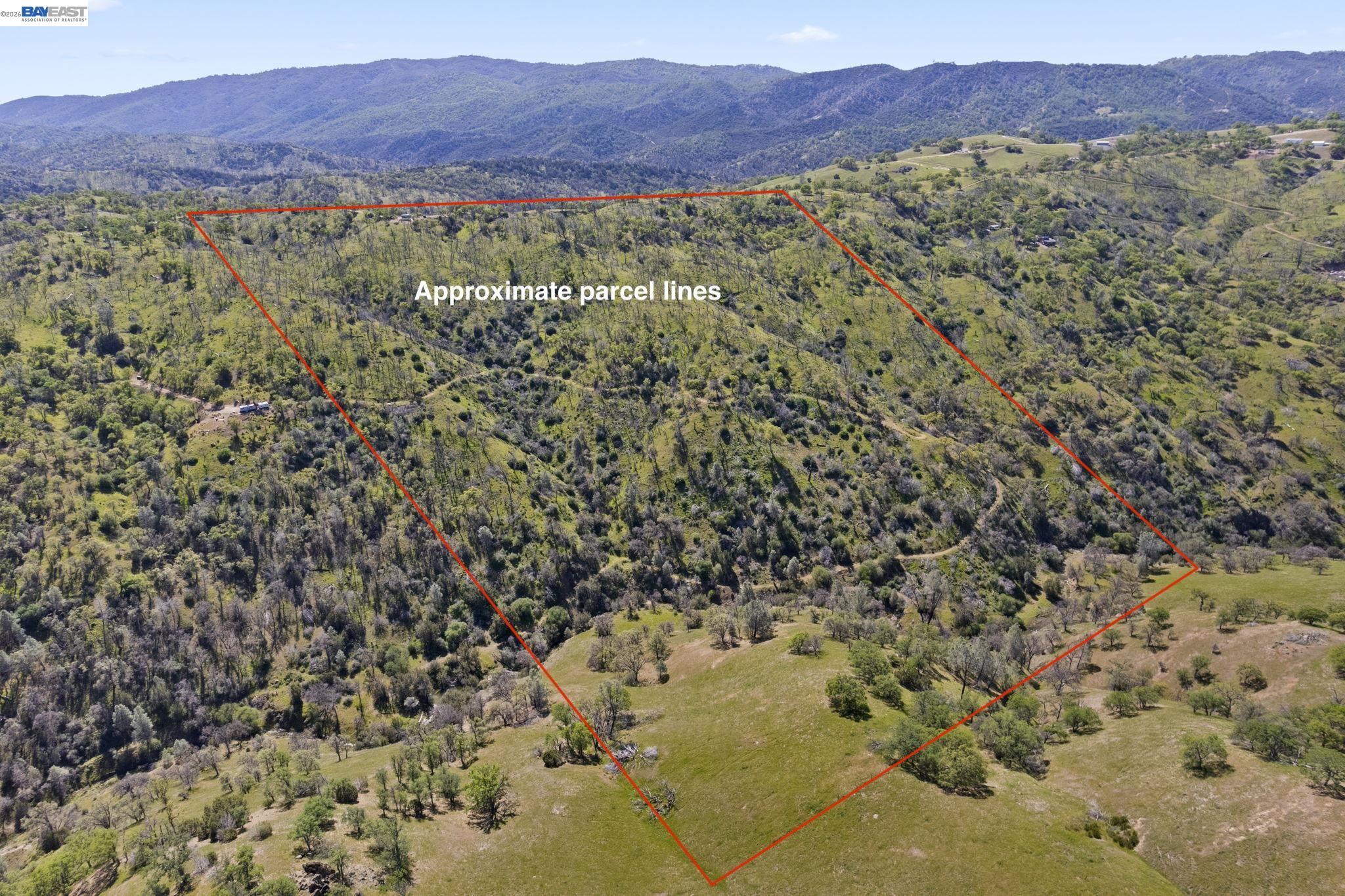 18188 West Corral Hollow Road Tracy, CA 95377 - Photo 35 of 58 a view of a lush green hillside and a houses