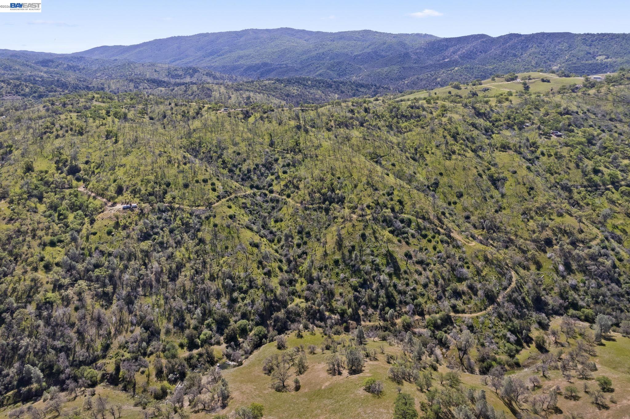 18188 West Corral Hollow Road Tracy, CA 95377 - Photo 40 of 58 a view of a lush green hillside and a mountain view