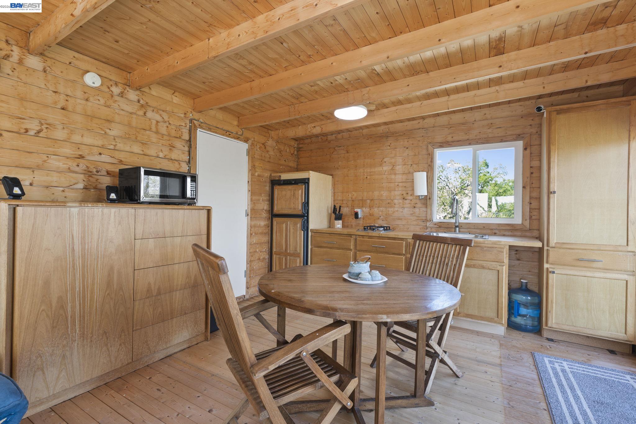 18188 West Corral Hollow Road Tracy, CA 95377 - Photo 5 of 58 a view of a dining room with furniture and window