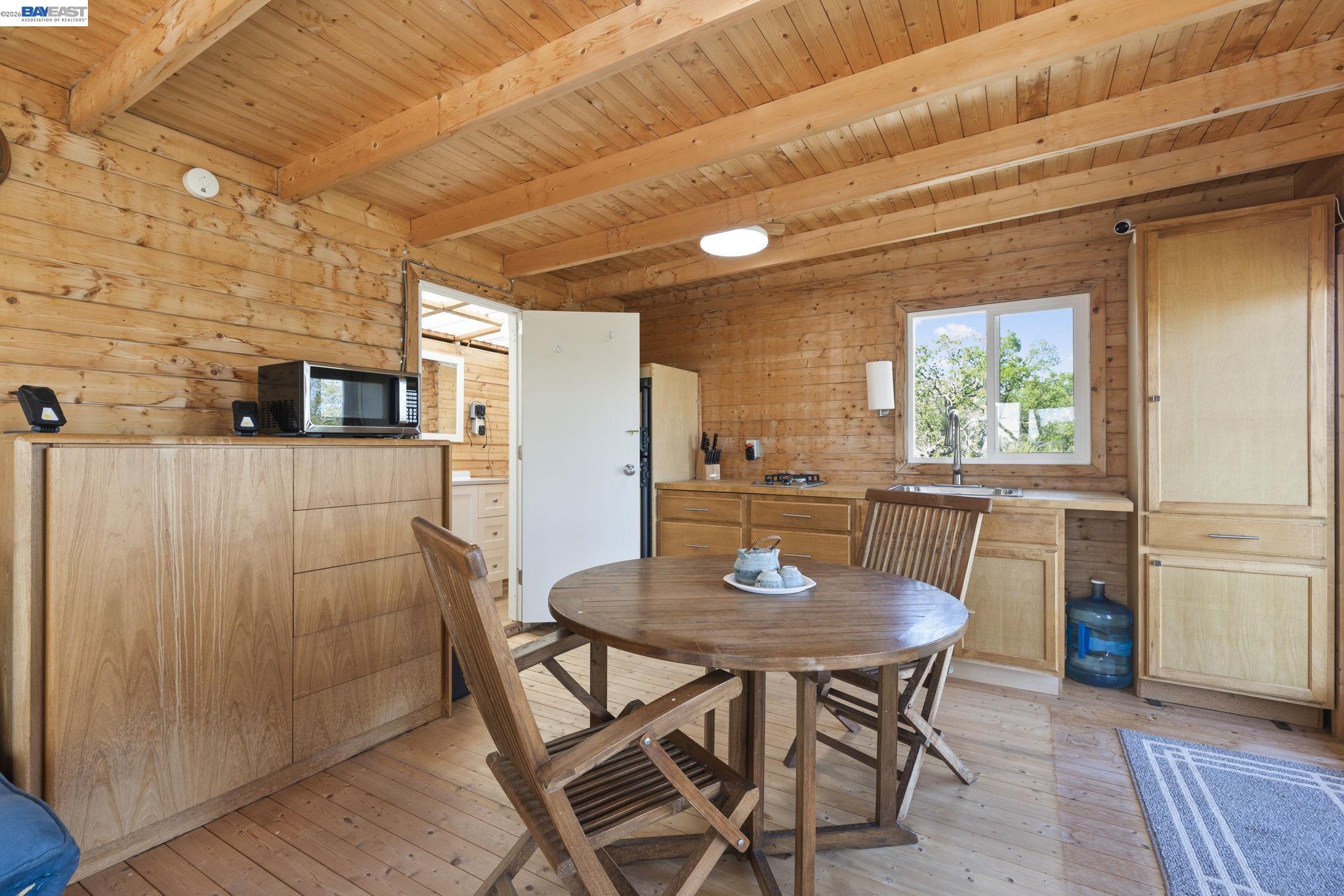 18188 West Corral Hollow Road Tracy, CA 95377 - Photo 6 of 58 a view of a dining room with furniture and window