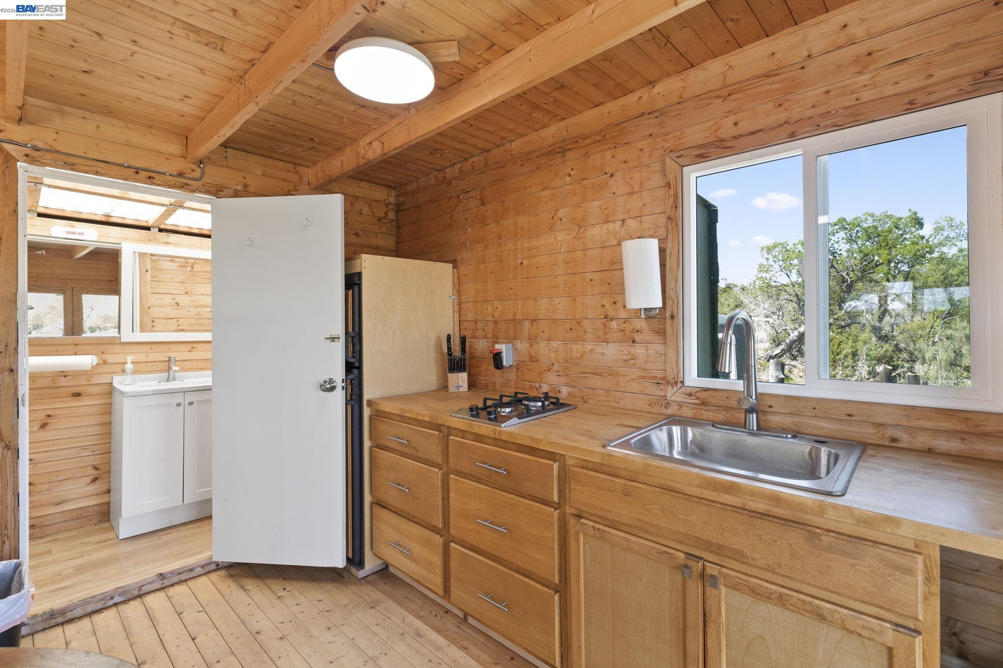 18188 West Corral Hollow Road Tracy, CA 95377 - Photo 7 of 58 a bathroom with a sink and a large mirror