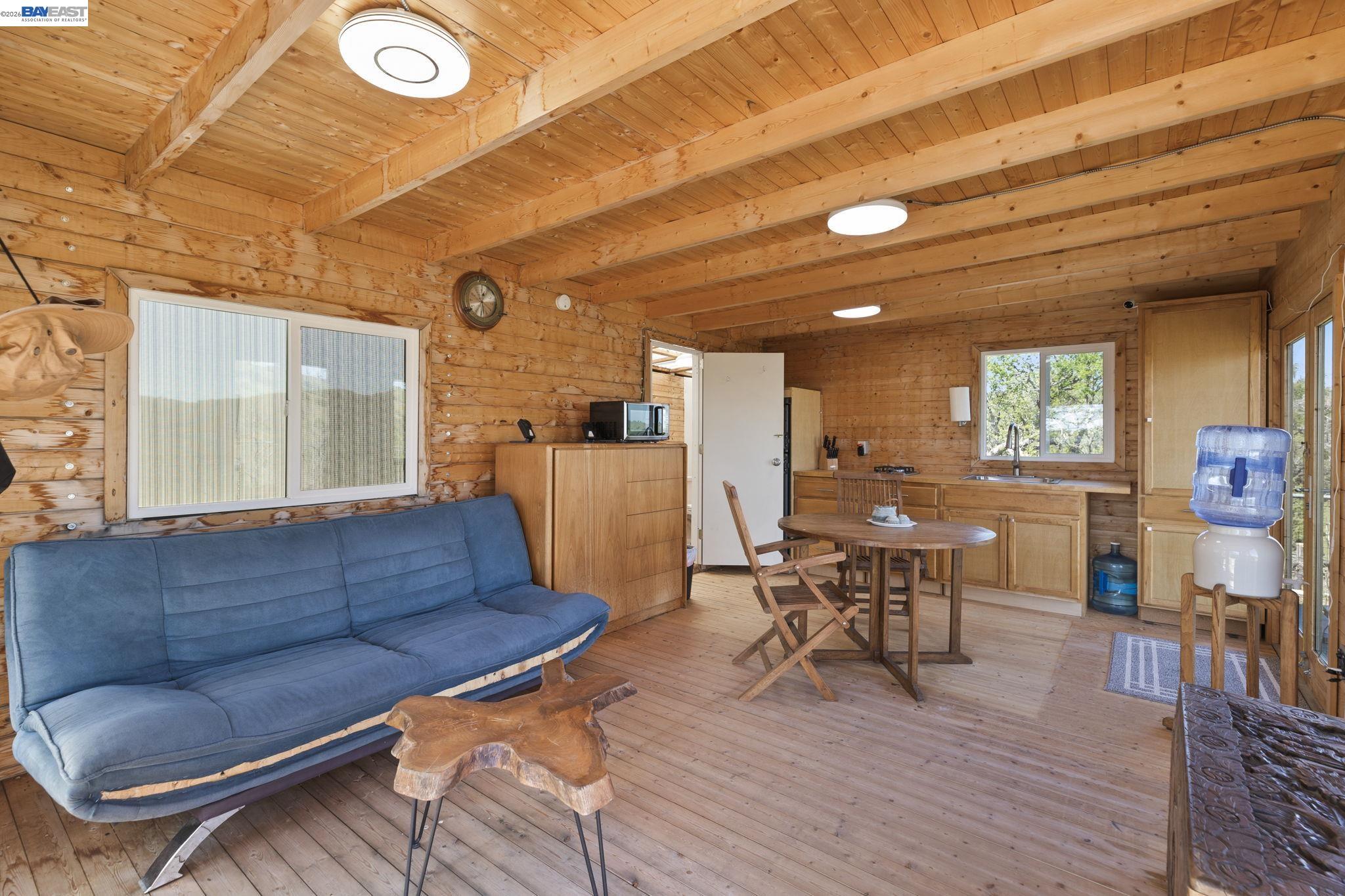 18188 West Corral Hollow Road Tracy, CA 95377 - Photo 9 of 58 a living room with furniture and wooden floors