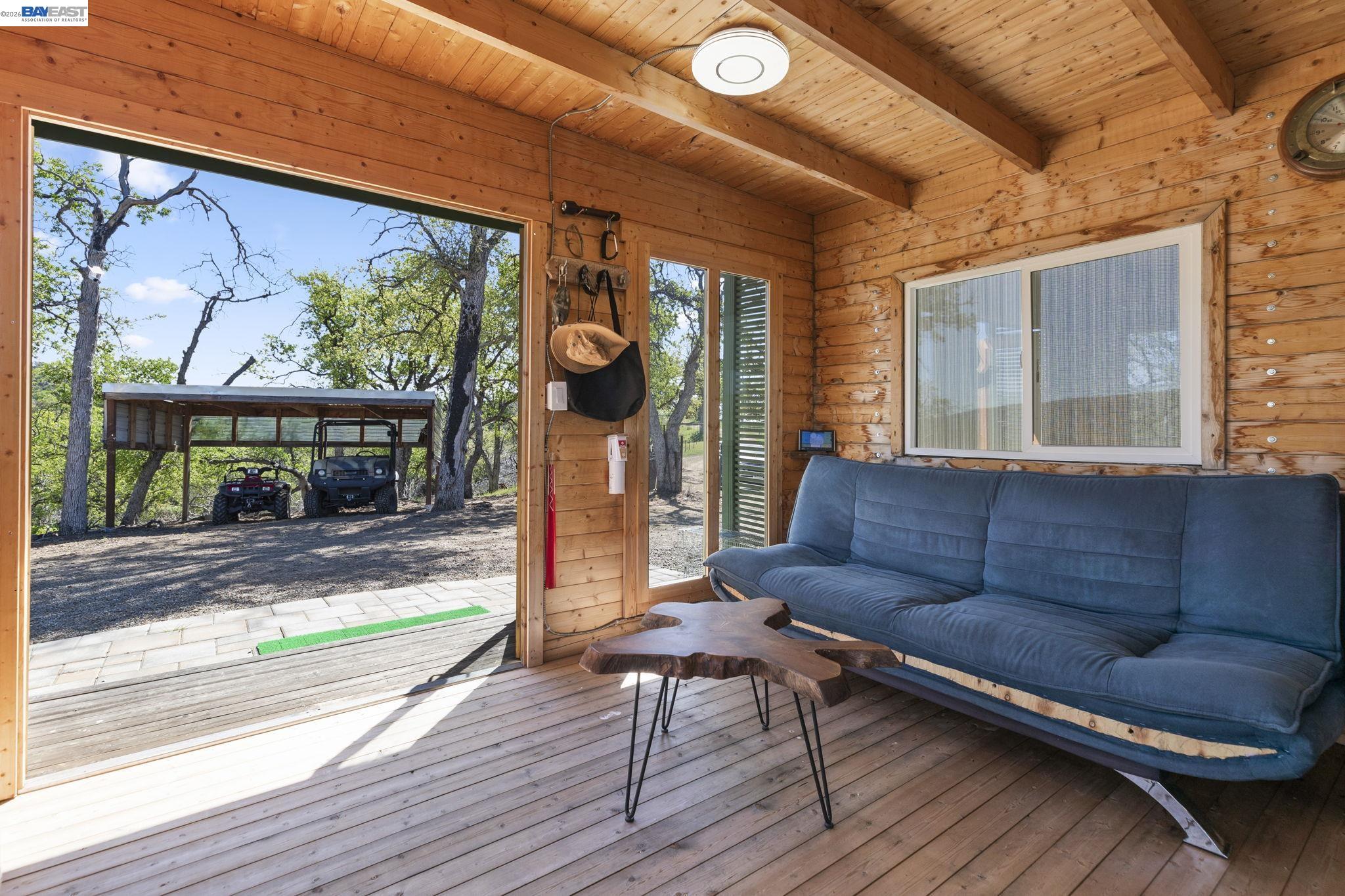 18188 West Corral Hollow Road Tracy, CA 95377 - Photo 10 of 58 a living room with furniture and a large window