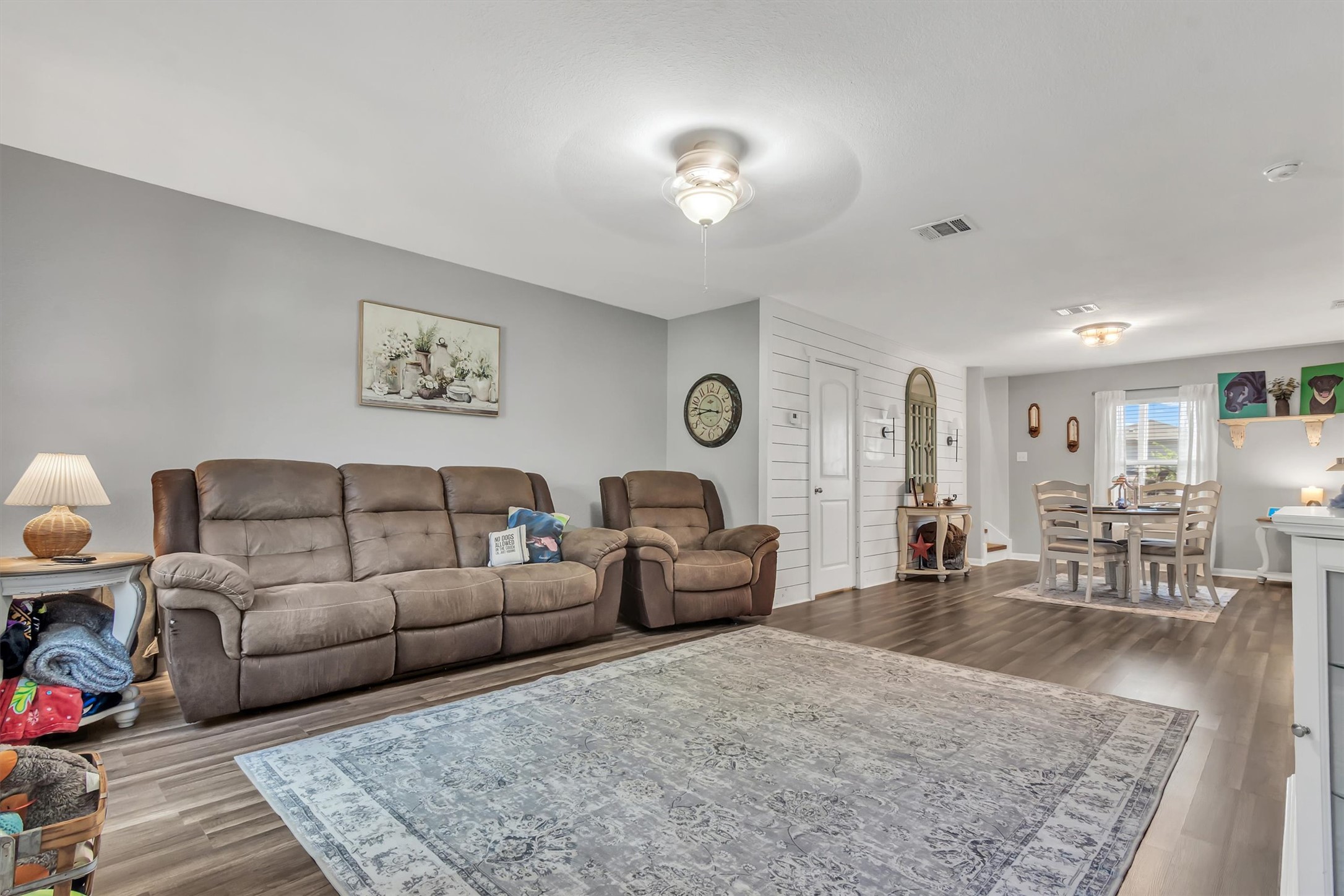 100 Wincliff Cove, Unit 13D Jarrell, TX 76537 - Photo 2 of 21 Brand new hardwood style looring flows seamlessly throughout this open concept living area, perfect for entertaining.