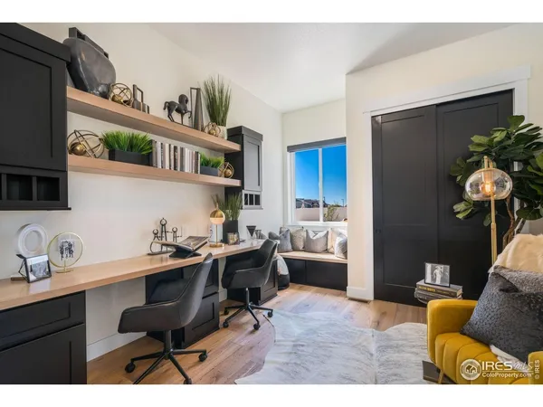 a workspace with furniture and bathroom