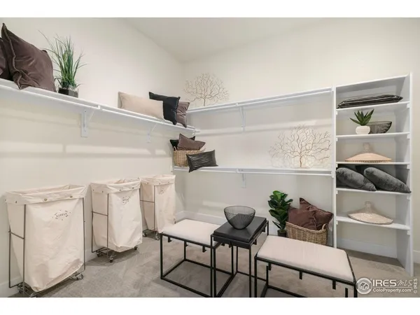 a view of furniture and a potted plant