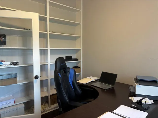 a bath tub sitting next to a window