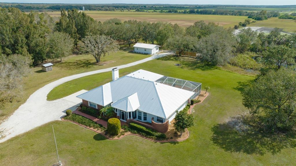 1950 Bern Creek Loop Sarasota, FL 34240 - Photo 3 of 60 a view of a swimming pool with lounge chair