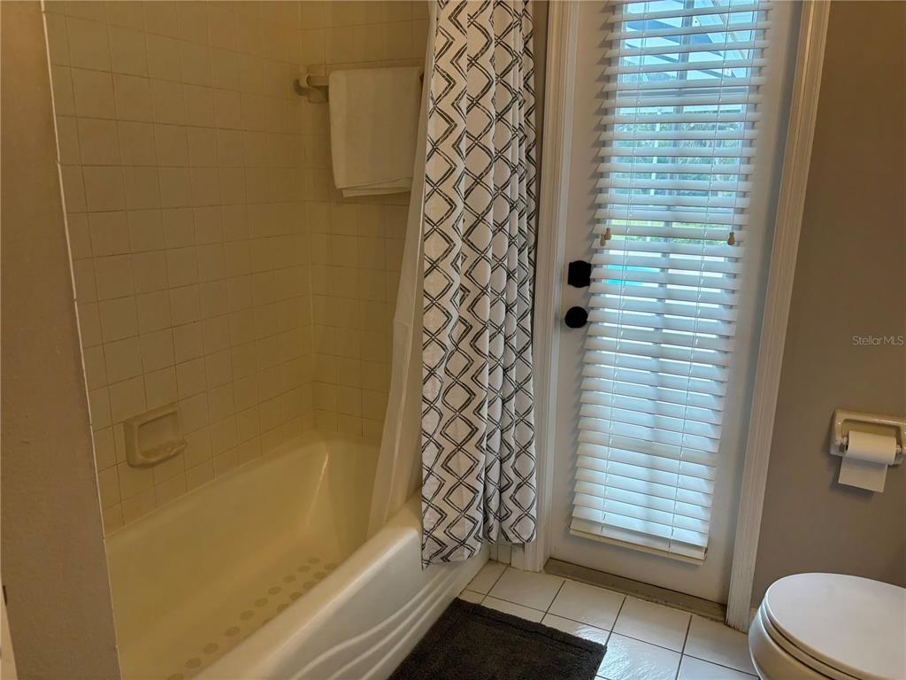 1950 Bern Creek Loop Sarasota, FL 34240 - Photo 41 of 60 a bathroom with a shower and a toilet