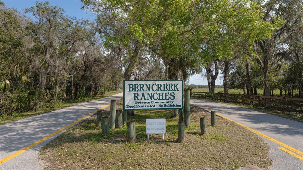 1950 Bern Creek Loop Sarasota, FL 34240 - Photo 5 of 60 a sign on the side of a road