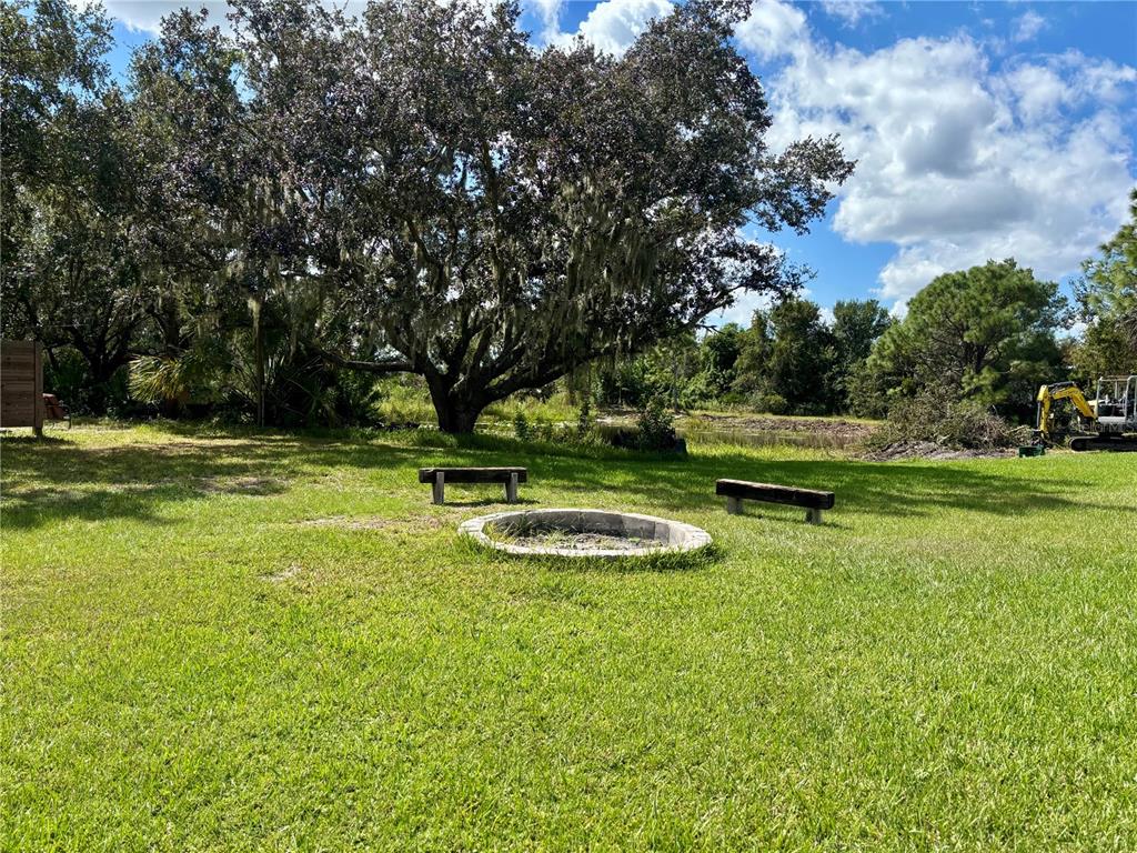 1950 Bern Creek Loop Sarasota, FL 34240 - Photo 53 of 60 a view of a playground with basketball court