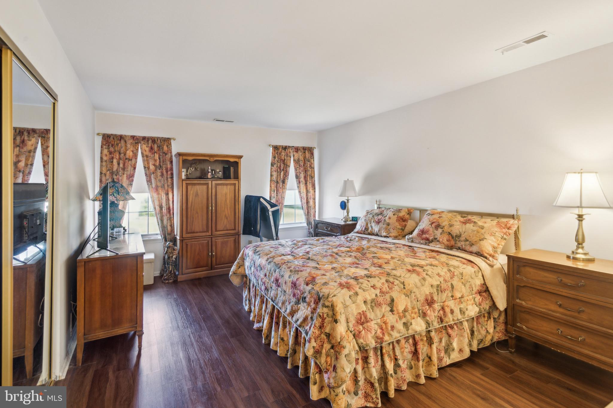 48 Eddystone Way Mount Laurel, NJ 08054 - Photo 19 of 30 a bed room with a bed and a lamp