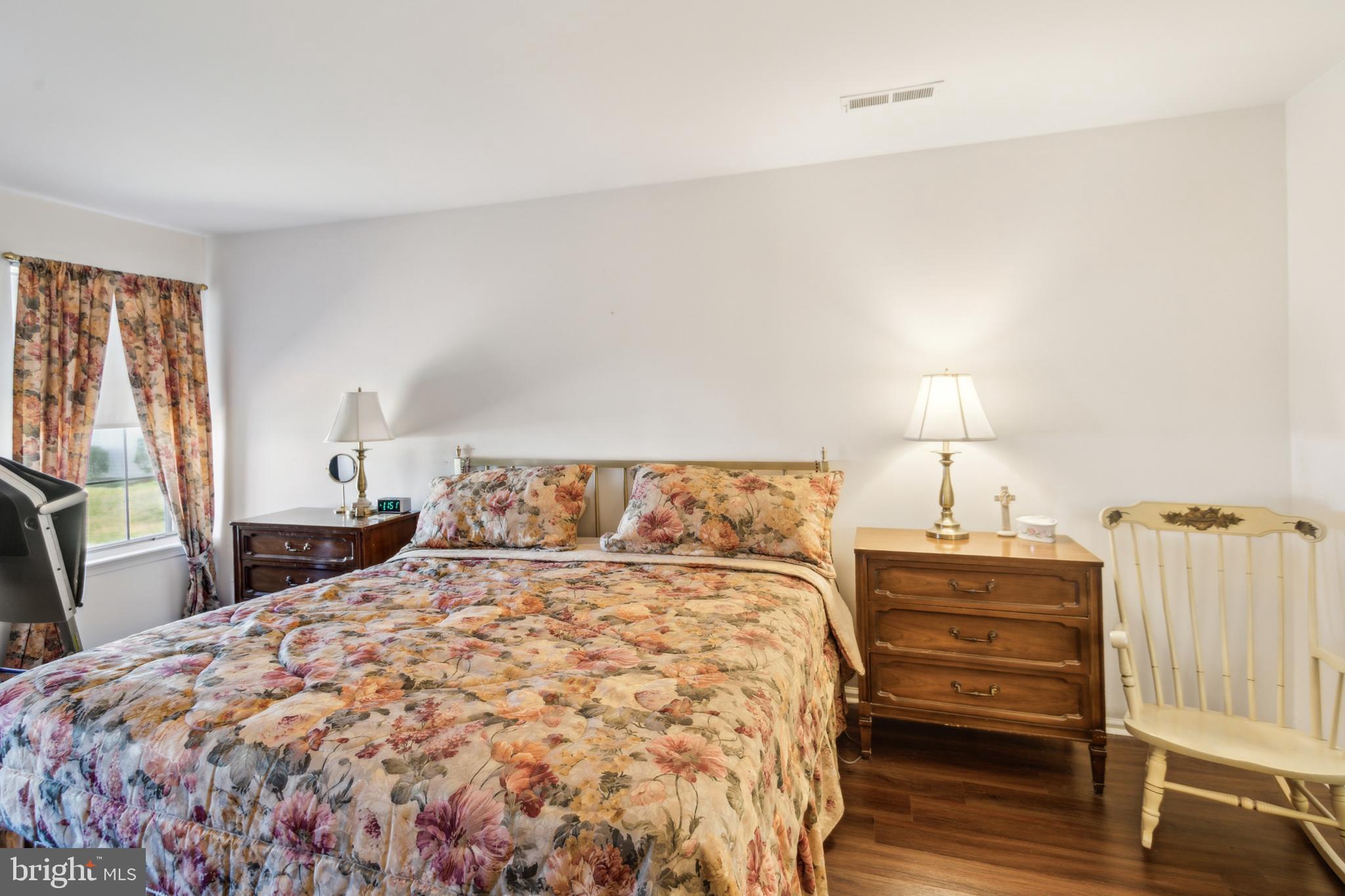 48 Eddystone Way Mount Laurel, NJ 08054 - Photo 20 of 30 a bedroom with a bed and a night stand