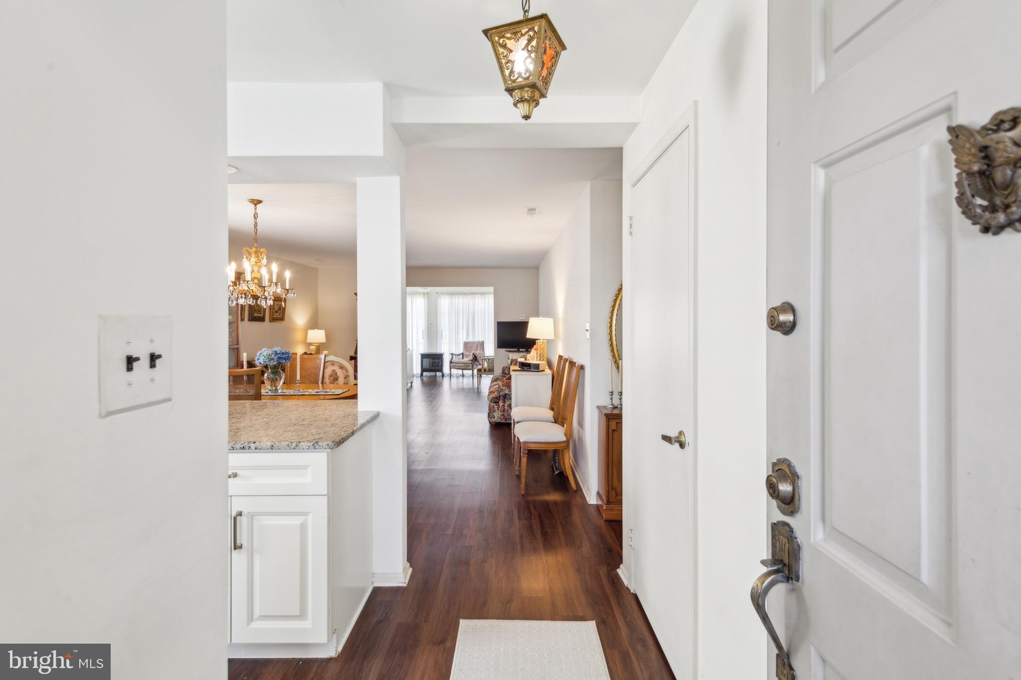 48 Eddystone Way Mount Laurel, NJ 08054 - Photo 4 of 30 a view of a hallway view with wooden floor and living room