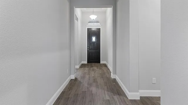 an empty room with closet area