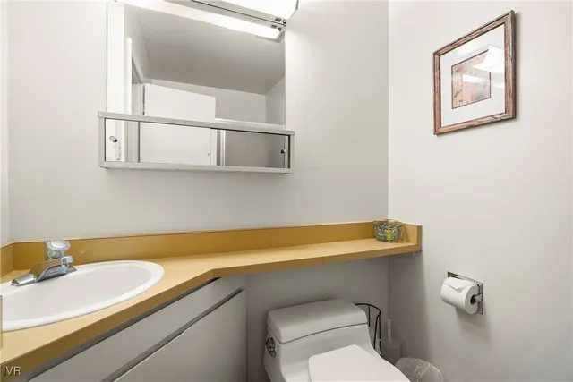a bathroom with a sink and a toilet