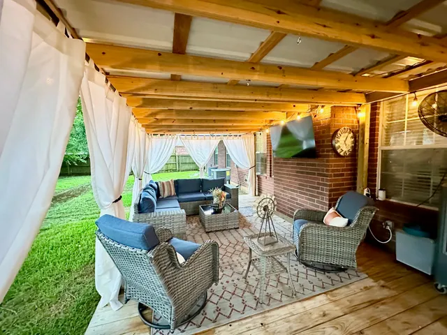 a outdoor living space with patio furniture