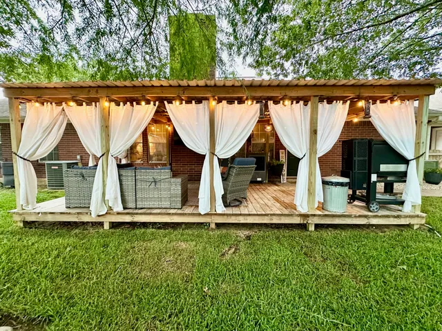 a view of a house with a patio
