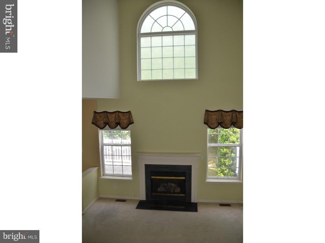 101 Avon Court Malvern, PA 19355 - Photo 5 of 20 Bright and airy living space with elegant windows.