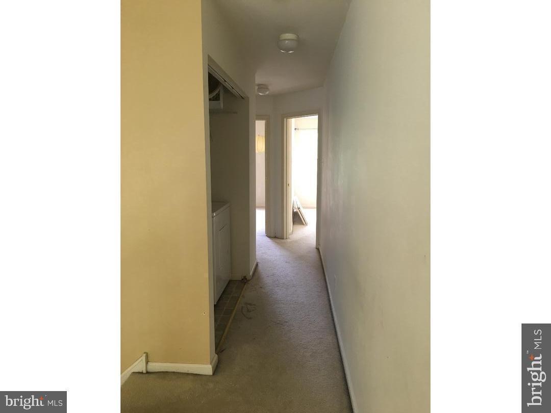 101 Avon Court Malvern, PA 19355 - Photo 8 of 20 Bright and inviting hallway awaits your touch.