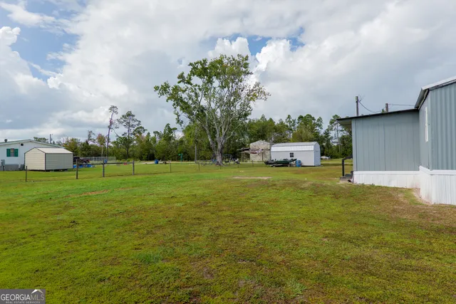 a house view with a garden space