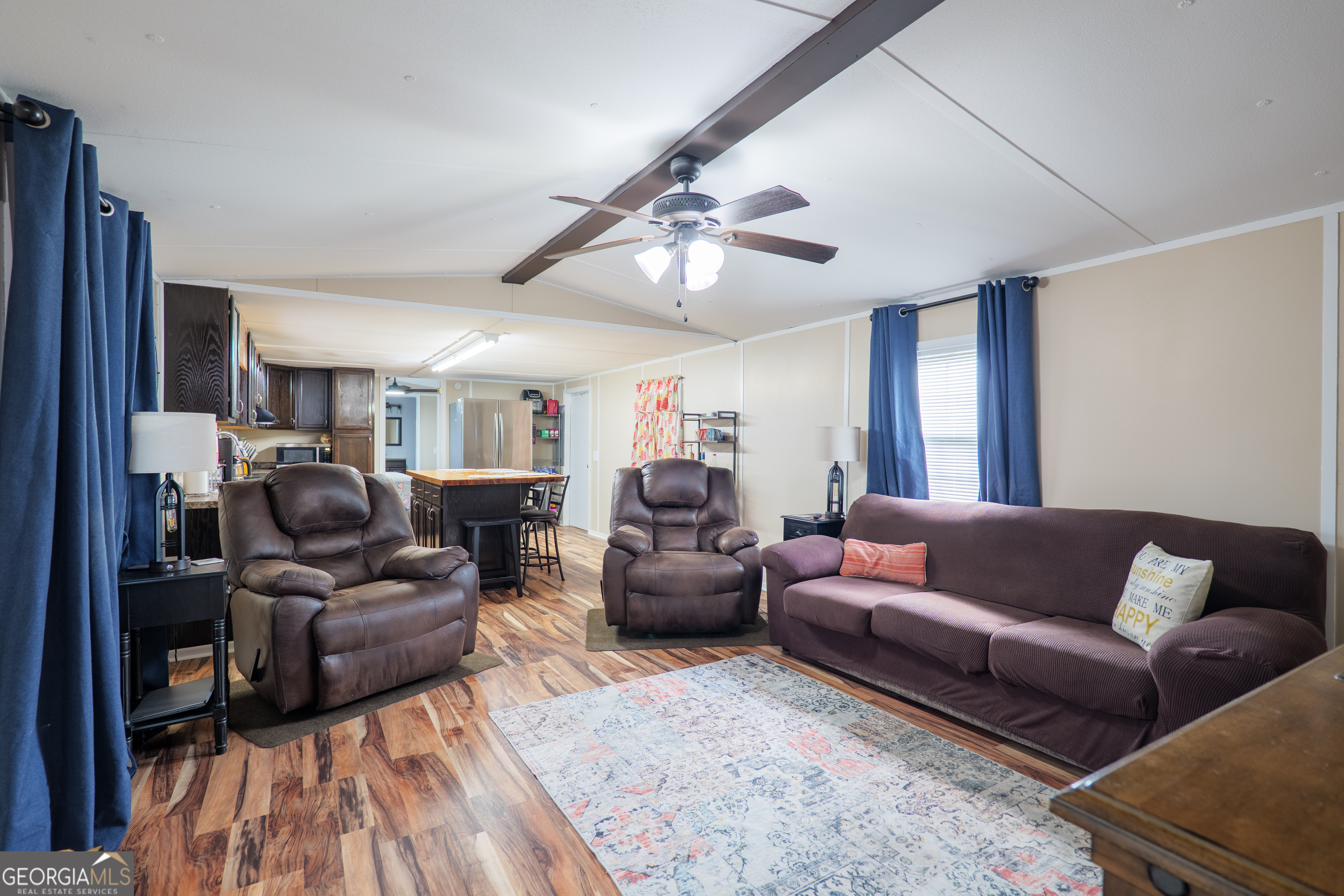 264 Cutting Road Homerville, GA 31634 - Photo 6 of 25 a living room with furniture and a wooden floor