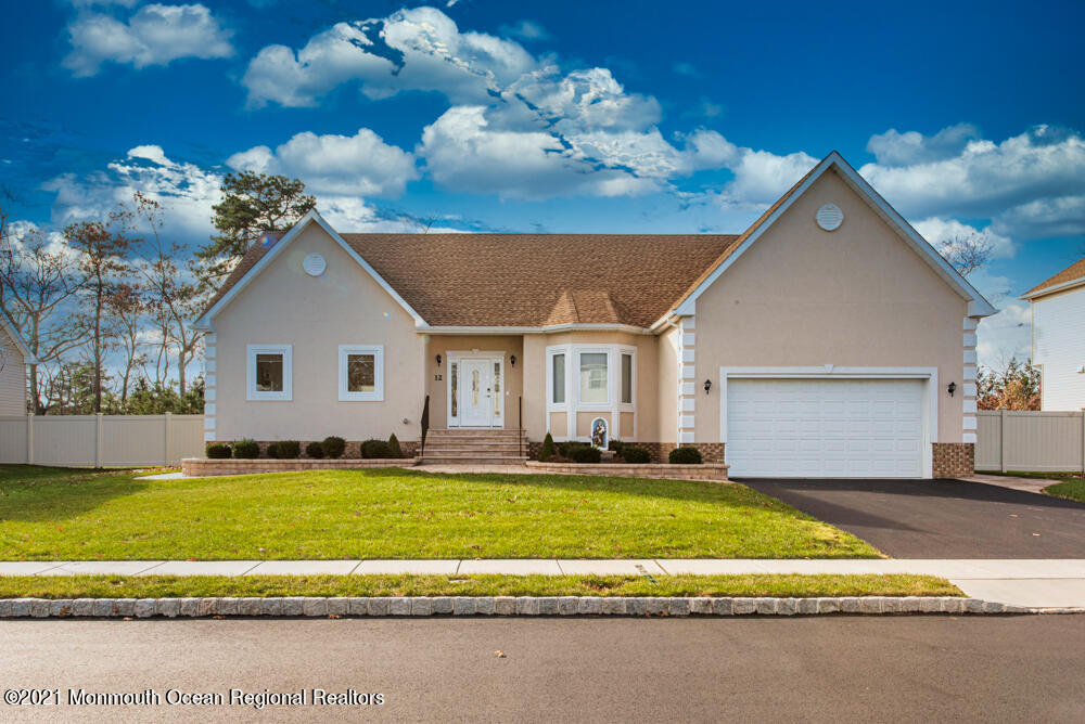 a view of a house with a big yard