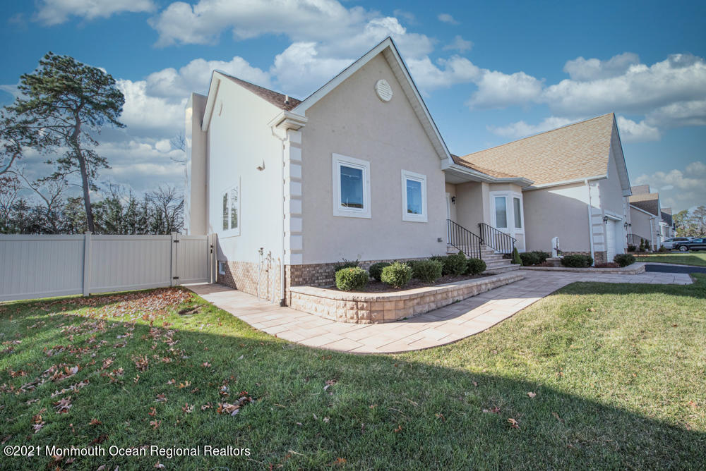 12 Cindy Court Howell, NJ 07731 - Photo 2 of 64 a view of a house with backyard and sitting area