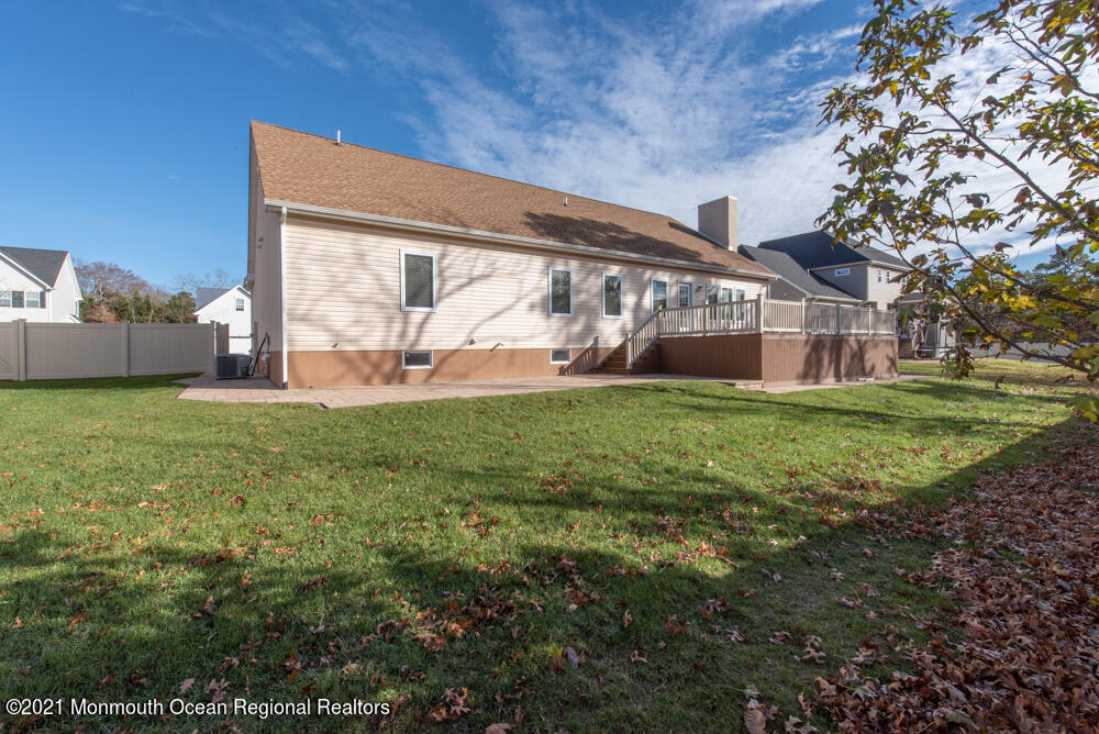 12 Cindy Court Howell, NJ 07731 - Photo 54 of 64 a view of a house with a yard and sitting area