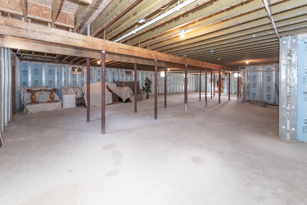 12 Cindy Court Howell, NJ 07731 - Photo 58 of 64 a view of an empty room with a couch