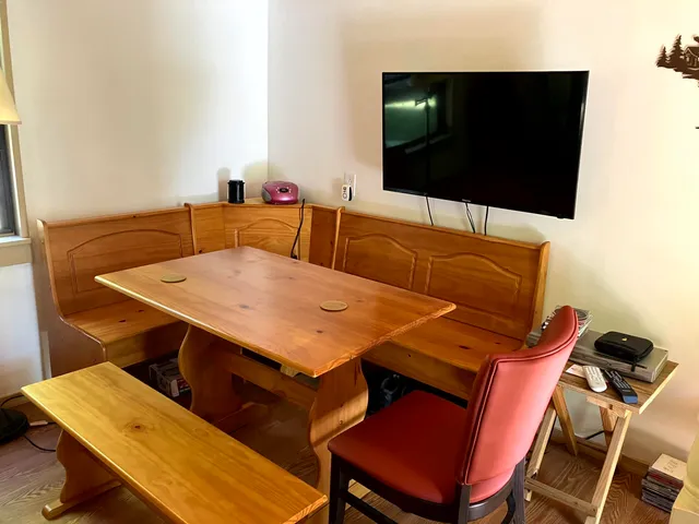 a view of a room with furniture