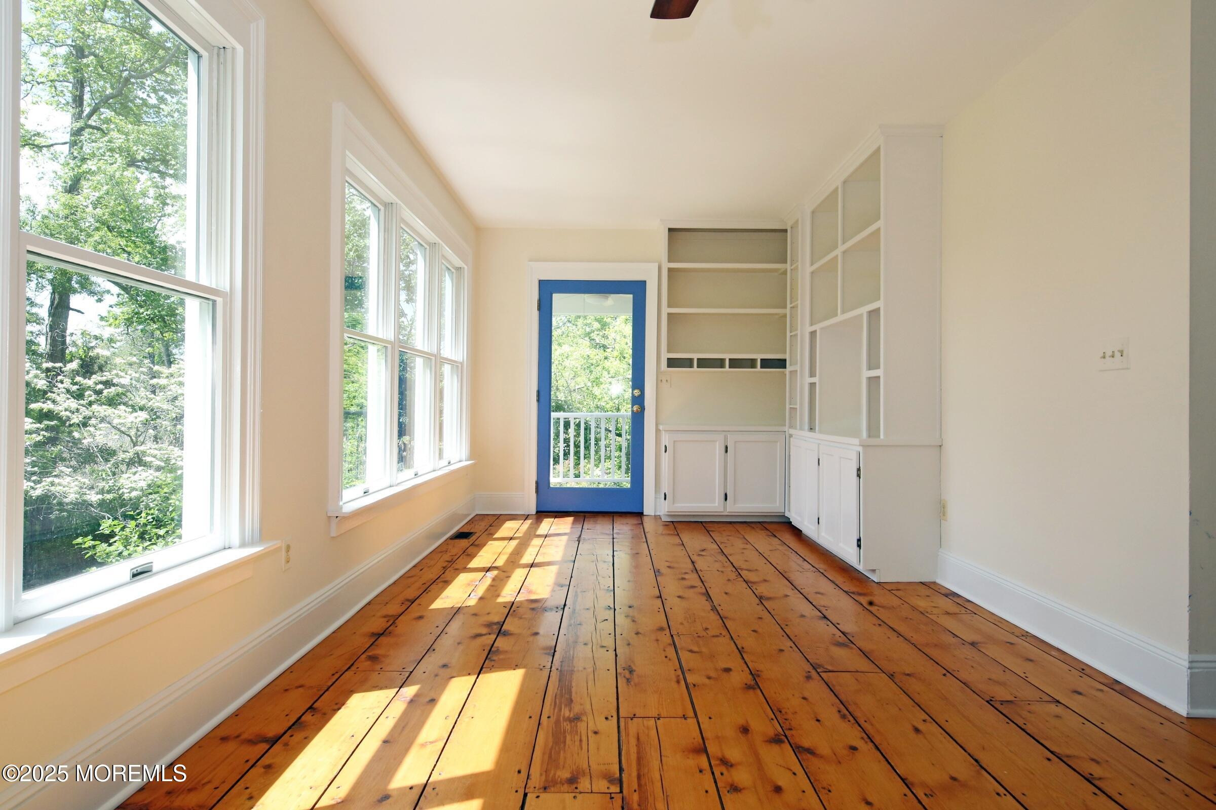 40 Riverside Avenue Oceanport, NJ 07757 - Photo 23 of 62 a view of empty room with wooden floor and fan