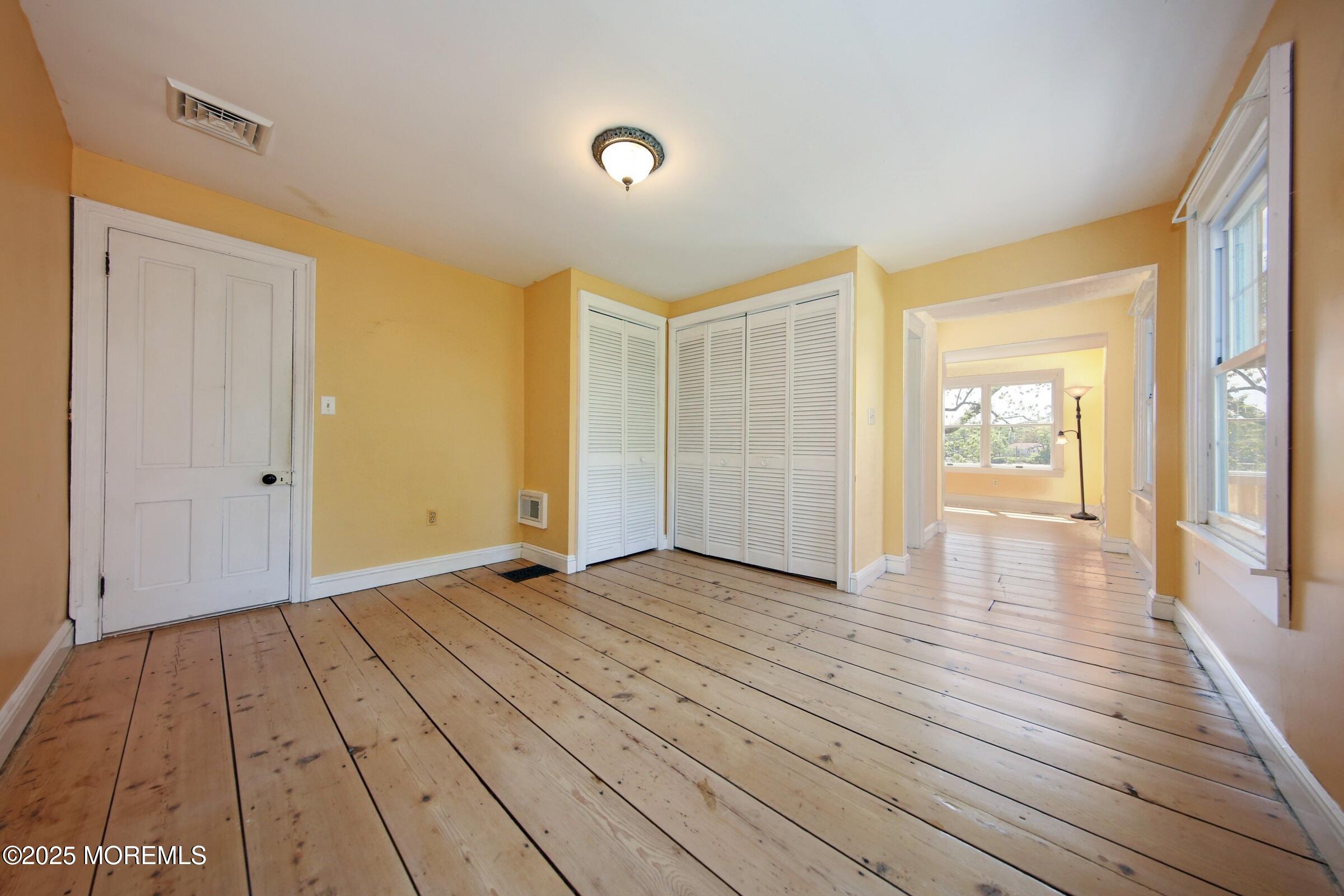 40 Riverside Avenue Oceanport, NJ 07757 - Photo 27 of 62 a view of an empty room and glass door