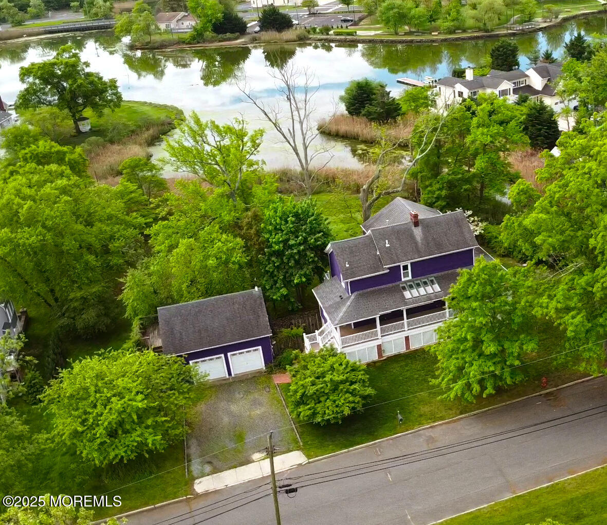 40 Riverside Avenue Oceanport, NJ 07757 - Photo 3 of 62 an aerial view of a house with garden space and lake view