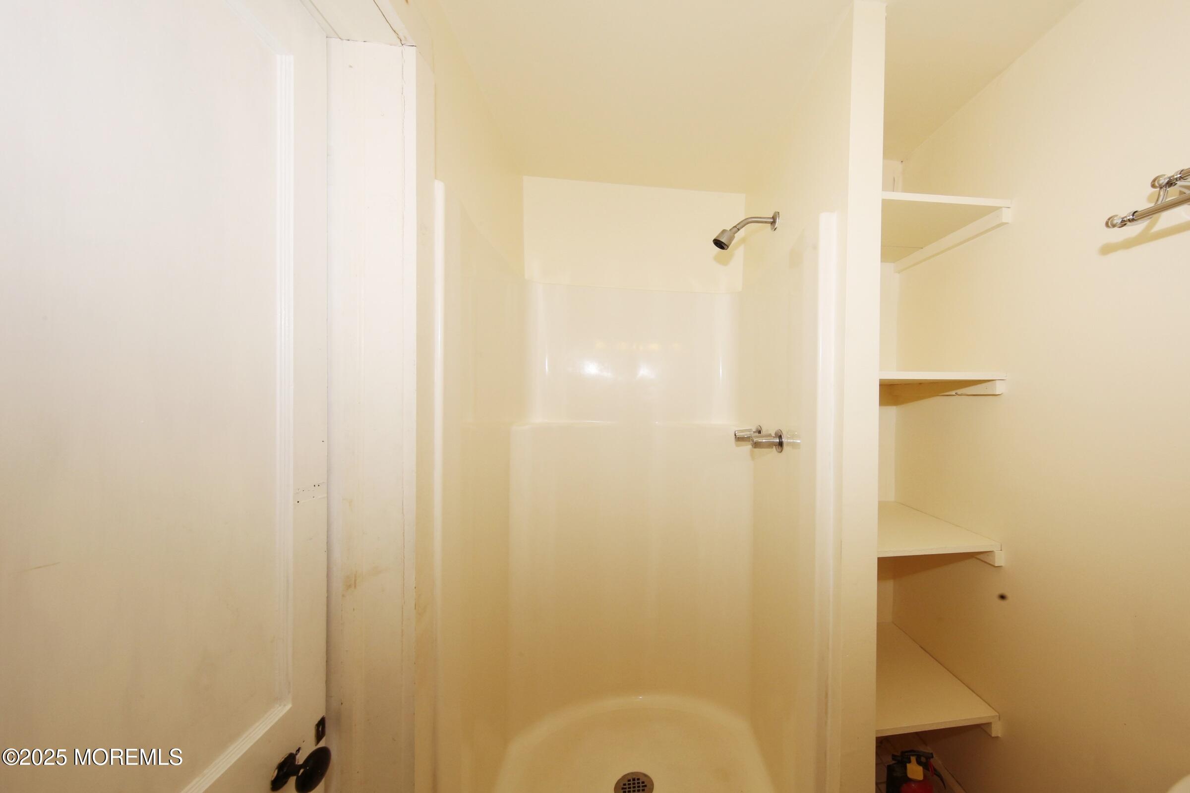 40 Riverside Avenue Oceanport, NJ 07757 - Photo 38 of 62 a bathroom with a shower