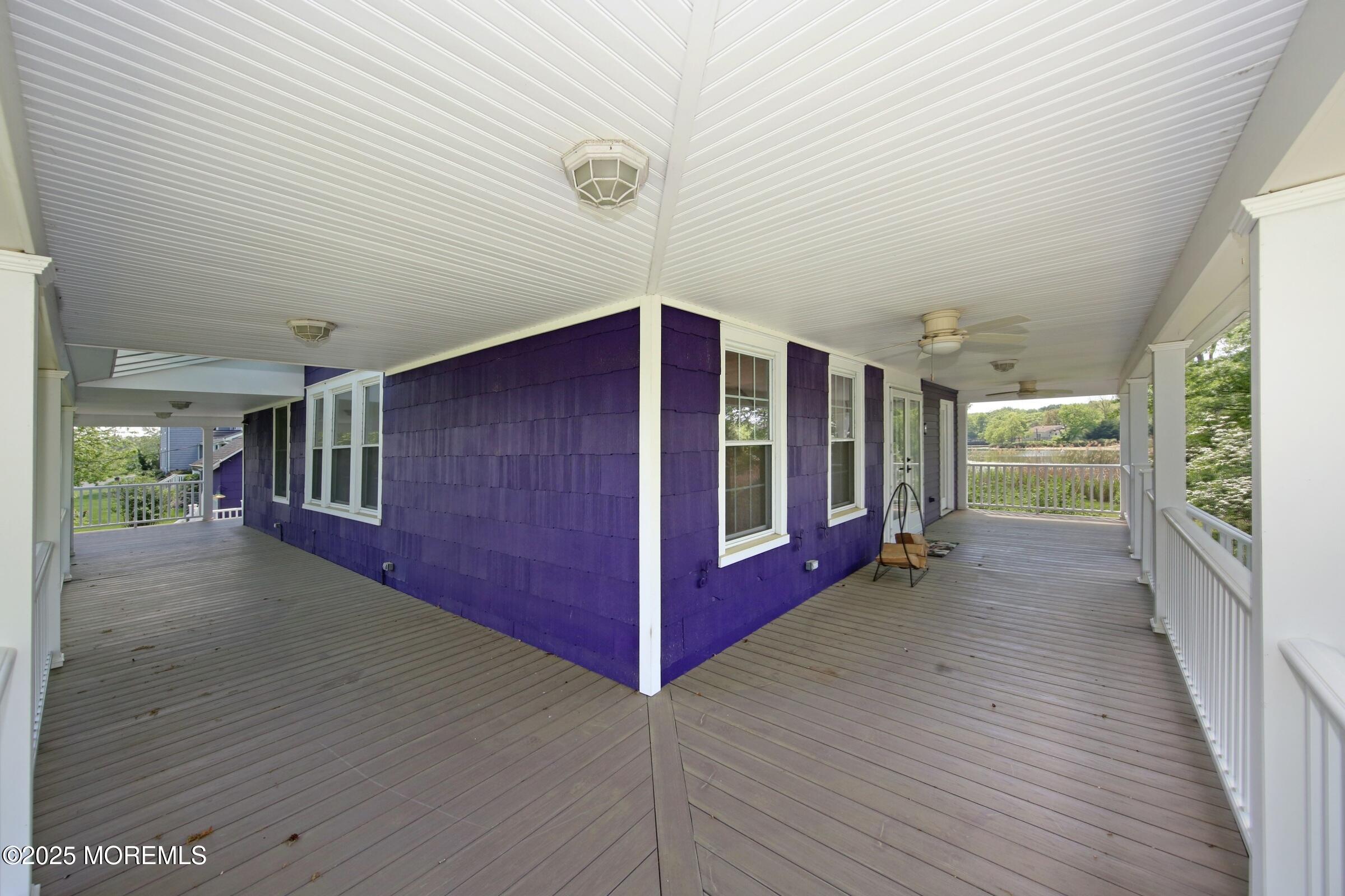 40 Riverside Avenue Oceanport, NJ 07757 - Photo 43 of 62 a view of hallway with wooden floor and windows