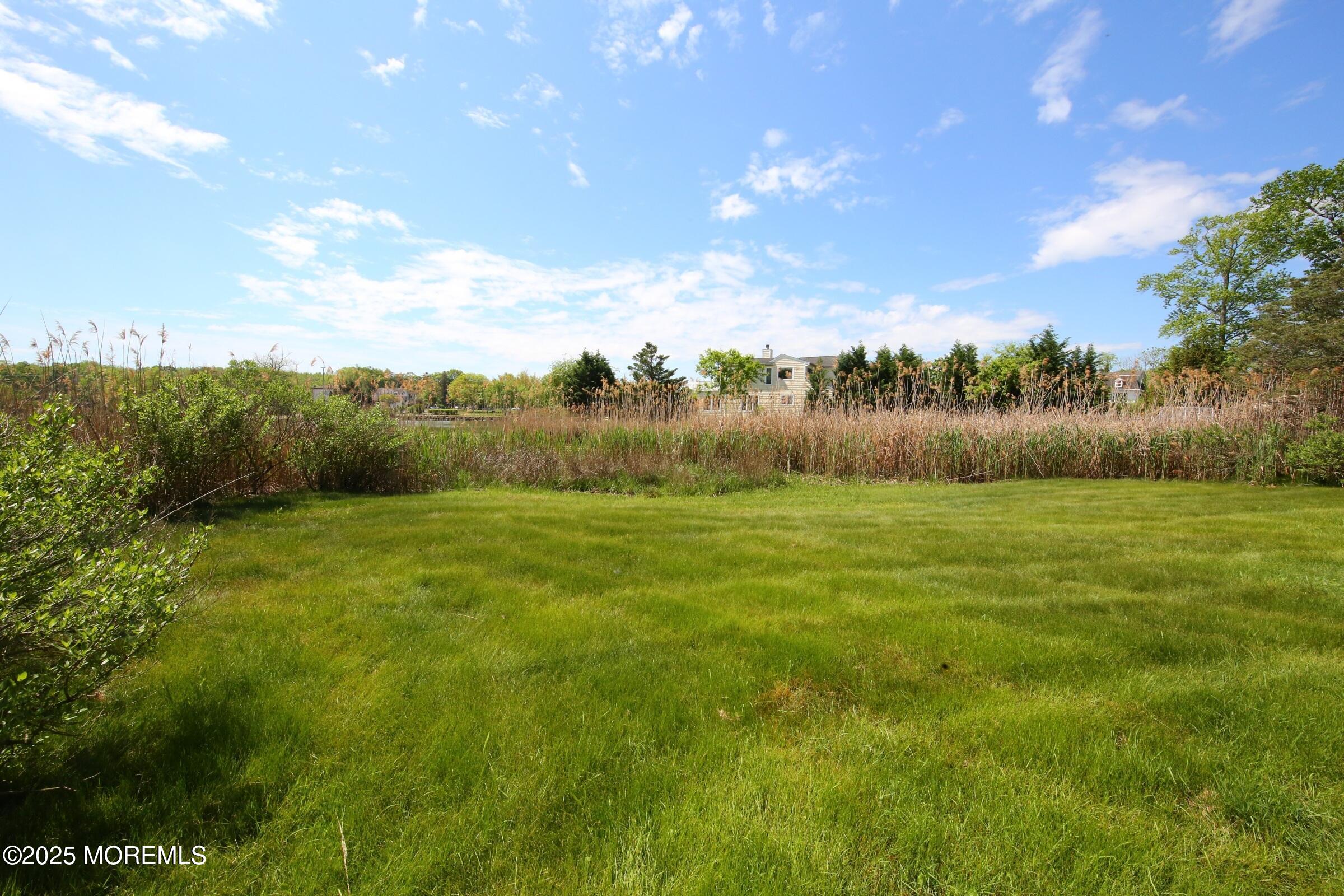 40 Riverside Avenue Oceanport, NJ 07757 - Photo 44 of 62 a view of an outdoor space and a yard