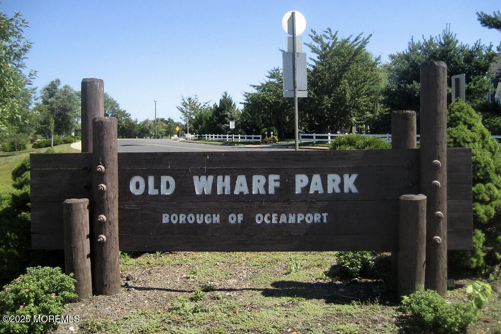 40 Riverside Avenue Oceanport, NJ 07757 - Photo 52 of 62 a view of a sign board with a small yard