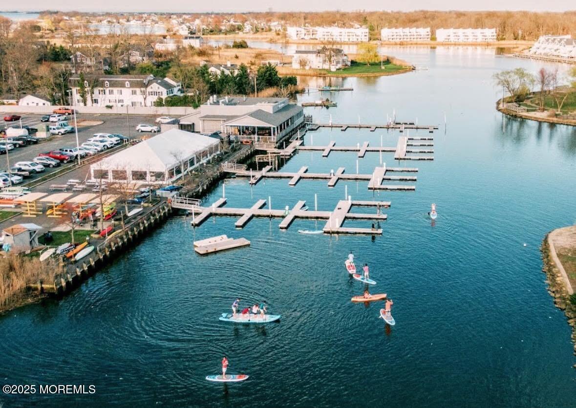 40 Riverside Avenue Oceanport, NJ 07757 - Photo 55 of 62 a view of a lake with a city