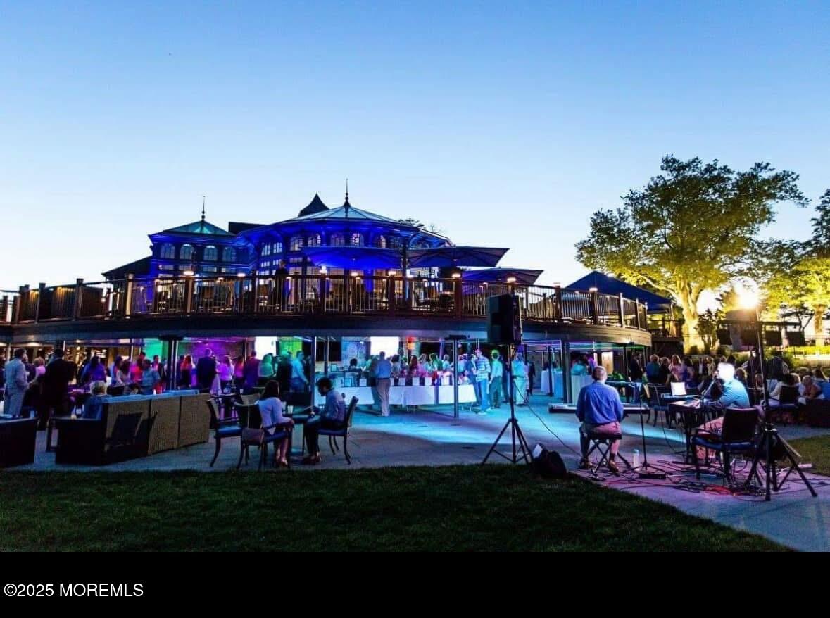 40 Riverside Avenue Oceanport, NJ 07757 - Photo 57 of 62 a group of people sitting in a park